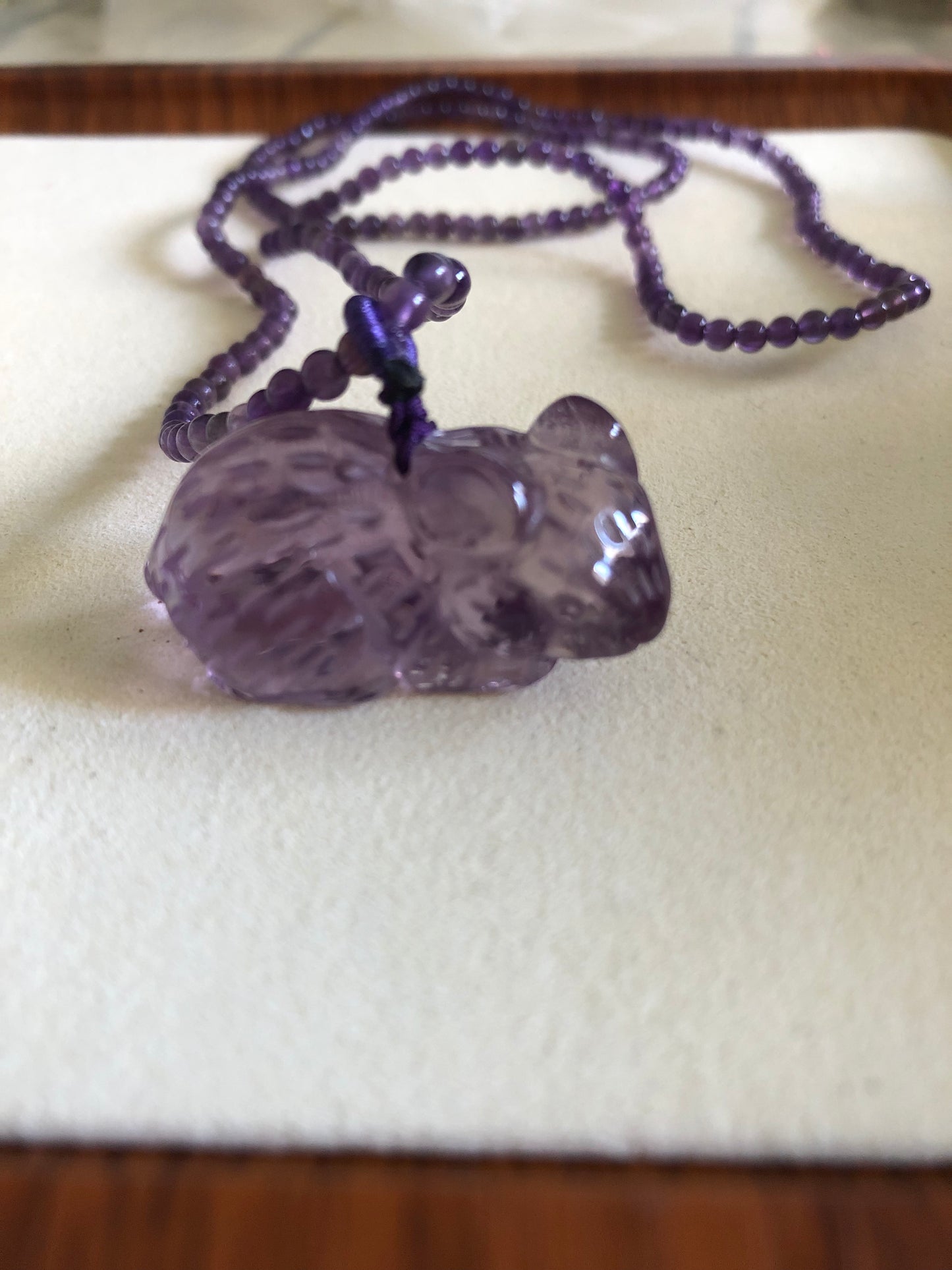 Natural hand caved amethyst mouse necklace