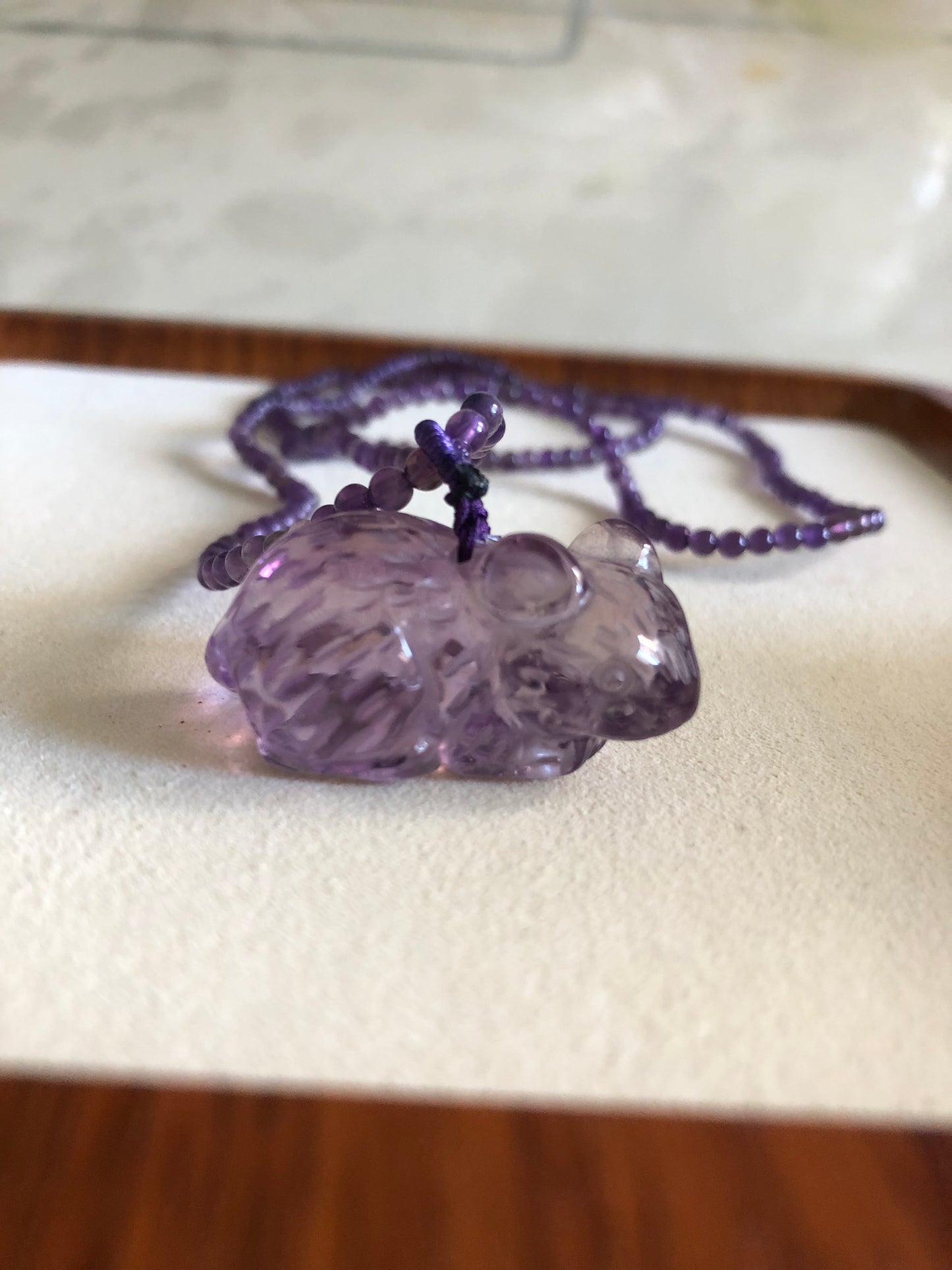 Natural hand caved amethyst mouse necklace