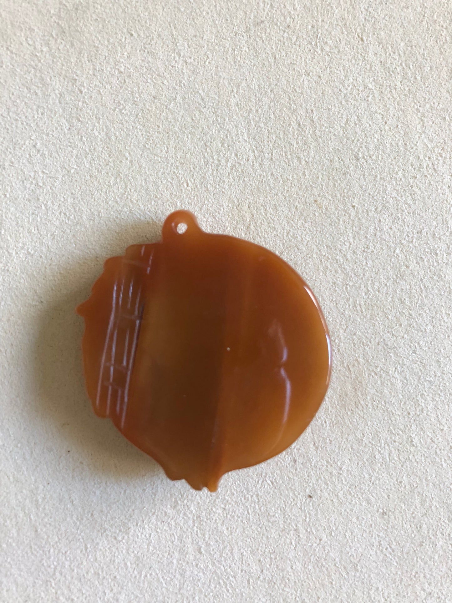 Warning red agate lion pendent